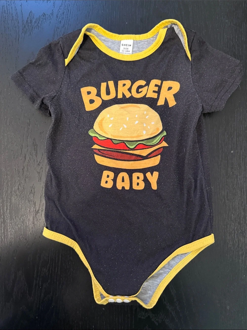 SHEIN Black and Yellow 'Burger Baby' Graphic One-Piece Bodysuit